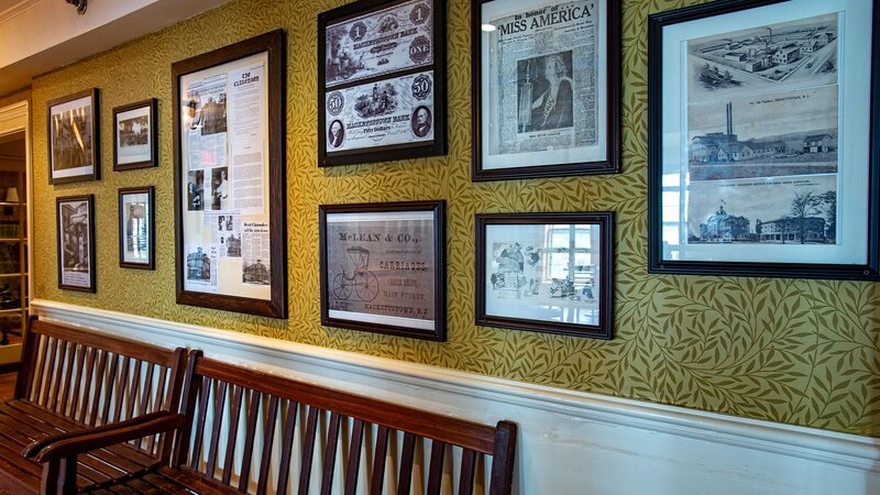 Waiting area with framed historic decorations